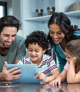 Family Looking at Tablet