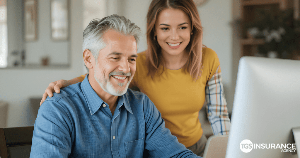 couple shops for homeowners insurance on their computer